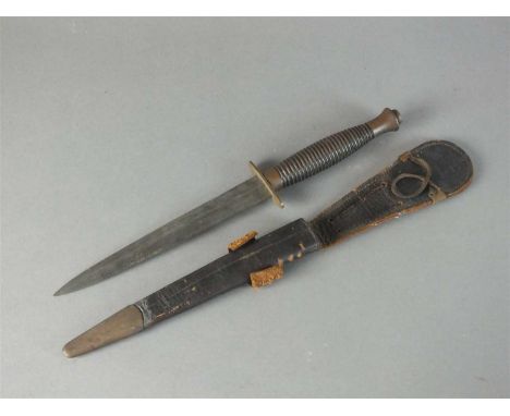 A WW2-era Fairbairn-Sykes Third Pattern Fighting Knife, with 17cm unmarked machine forged diamond section steel blade, overal