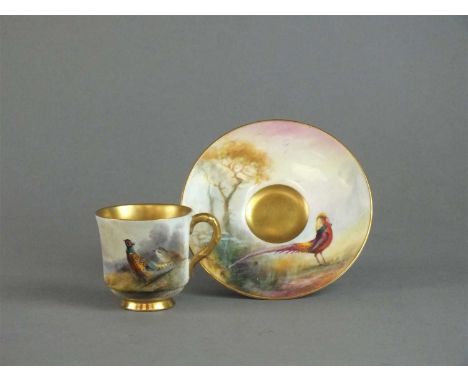Royal Worcester demitasse cup and saucer dated 1918 painted with cock and hen pheasants in woodland landscape by James Stinto
