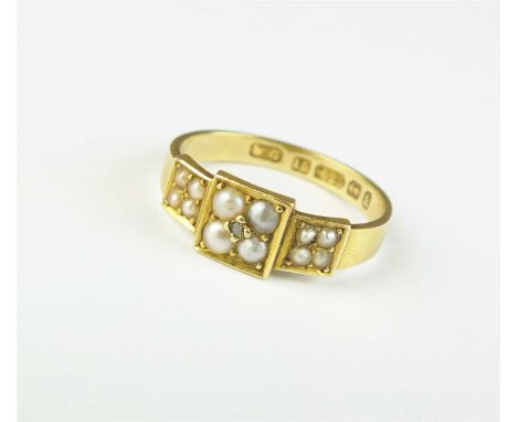A Victorian 15ct gold seed pearl and diamond ring, designed as a central diamond point claw set within four split seed pearls