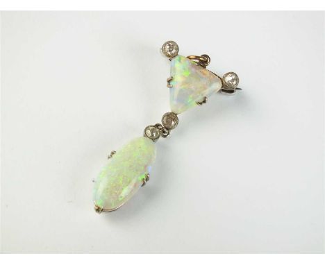 An opal and diamond pendant/brooch, designed as a triangular opal plaque, each corner set with an old cut diamond and suspend