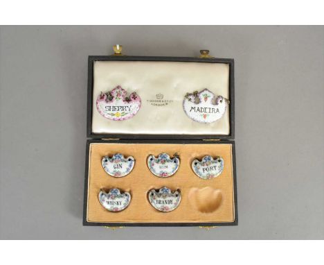 A cased set of five Crown Staffordshire porcelain decanter labels, comprising 'Gin, Port, Brandy, Whisky, Rum', each with flo