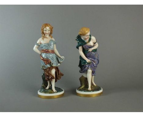 A pair of Royal Worcester porcelain figures of 'Before and After the Wind', circa 1878, modelled by James Hadley, printed and