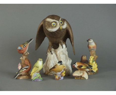 A collection of approximately twenty single and five double models of Royal Worcester birds including Marsh Tit, Wood Warbler