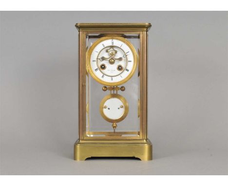 A 19th century French four glass brass framed mantle clock by Henry Marc, Paris, the stepped white enamelled dial populated w