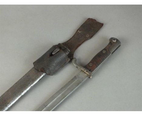 A WW1 German M98/05 'Butcher' bayonet the blade by Rich. A. Herder, Solingen, back-edge stamped with 'W/18' and crown above I