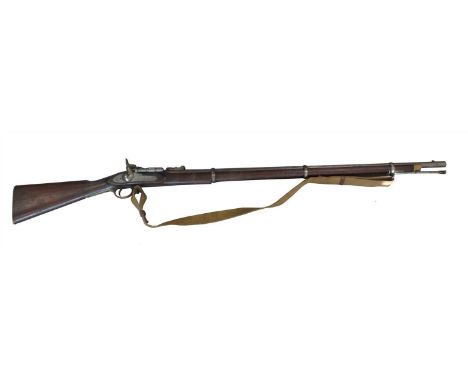 A Snider-Enfield .577 calibre triple-banded breech loading service rifle with percussion hammer, the lockplate dated 1861 wit