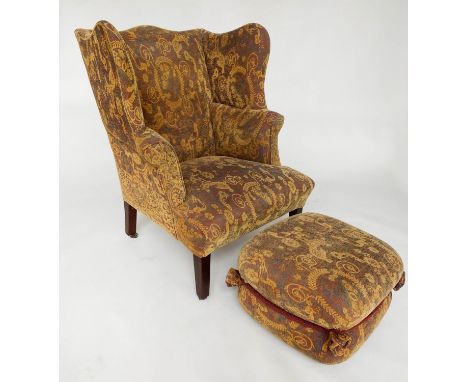 WING ARMCHAIR, 19th century mahogany, in George III style, with tapestry type upholstery and matching later footstool, 79cm W