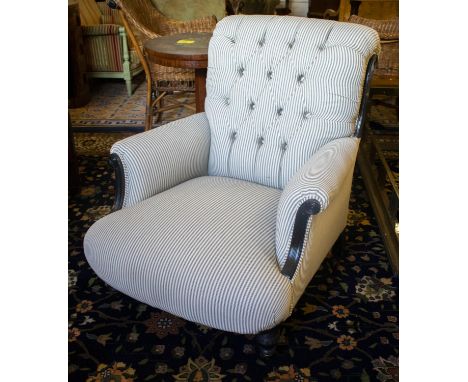 ARMCHAIR, 88cm H x 78cm W, Victorian, ebonised, circa 1880, in ticking, with ceramic castors. 