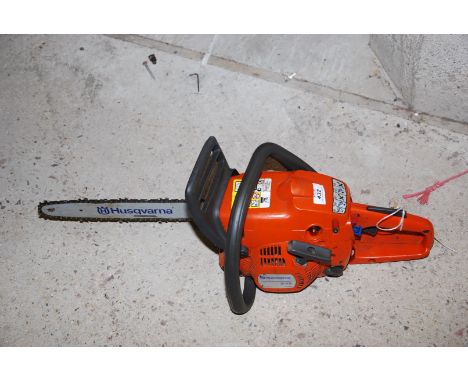 A Husqvarna 236 chainsaw with chain brake, 13" cutter bar, good compression.