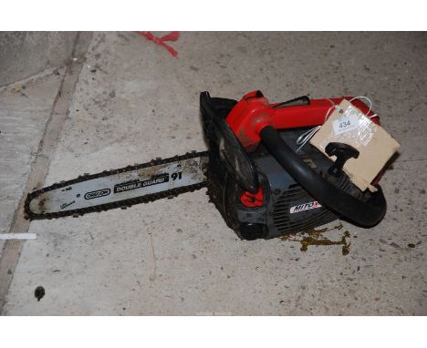 A Mito X chainsaw with chain brake, good compression.