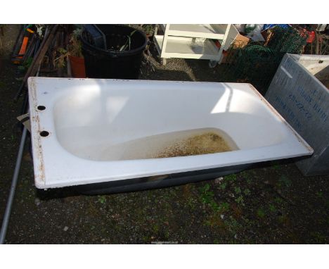 A metal enamel bath.
