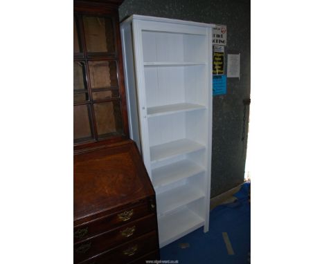 A white hardwood shelf unit - 26" wide x 75" high x 12" depth. 