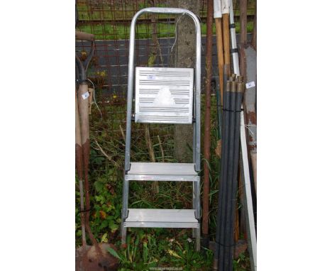 A three rung step ladder.
