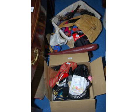 Roller skates, a toy gun, and a box of dressing up clothes.