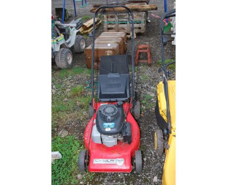 A 'Laser Omega 53' propelled lawn mower with Honda 4.5 engine and grass box - good compression.