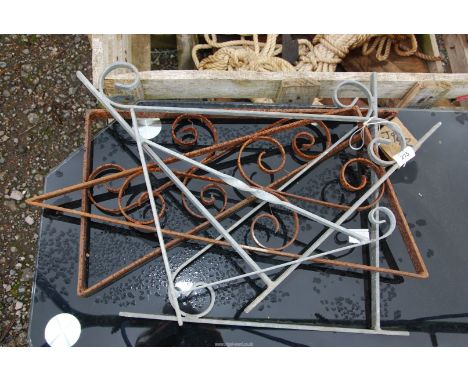 A quantity of wrought iron shelf brackets.