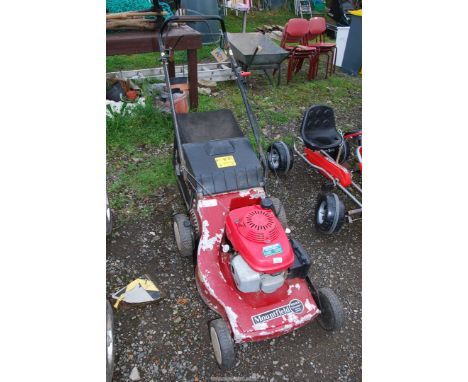 A propelled mower with grass collector with Honda engine - Good compression.