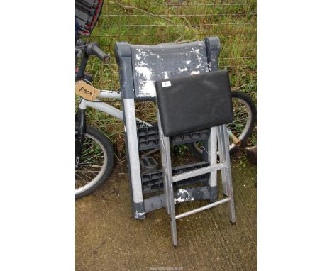 Two step ladders; one aluminium, one plastic.