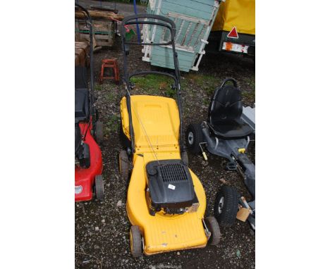 A 'Tiger' propelled lawn mower with grass box - engine turns.