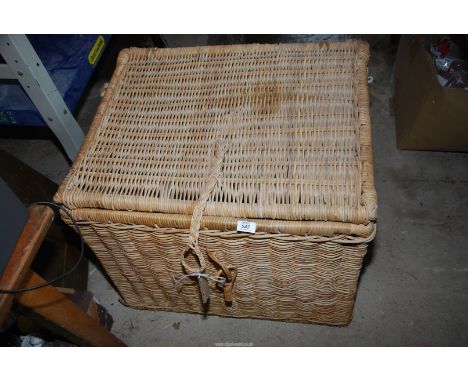 A wicker trunk 27'' x 22'' x 23'' high.