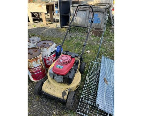 A power mower, no grass box - engine turns.