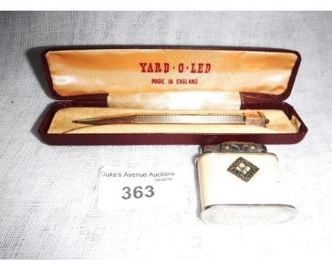 A ROLLED GOLD PENCIL in case and a lighter