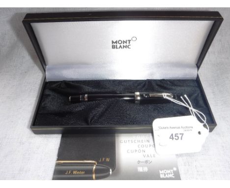 A MONT BLANC ROLLERBALL PEN, platinum plated
