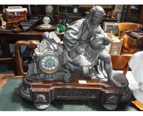 A 19TH CENTURY 'CHRISTOPHER COLUMBUS' MANTEL CLOCK with a circular dial beside a spelter sculpture of Christopher Columbus ho