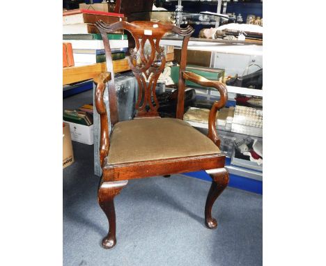 A CHIPPENDALE STYLE MAHOGANY ARMCHAIR on cabriole legs
