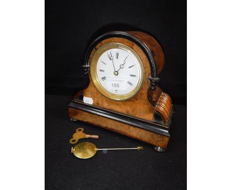 A VICTORIAN WALNUT AND EBONISED CASED MANTEL CLOCK 8" high (key and pendulum in office)