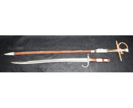 A SWORD BAYONET and a narrow dress sword in scabbard