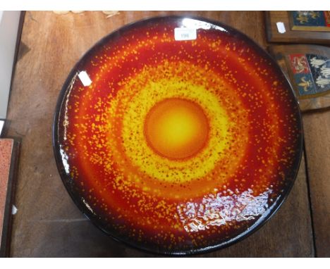 A LARGE POOLE POTTERY CHARGER 'SUN' 15.75" diameter 