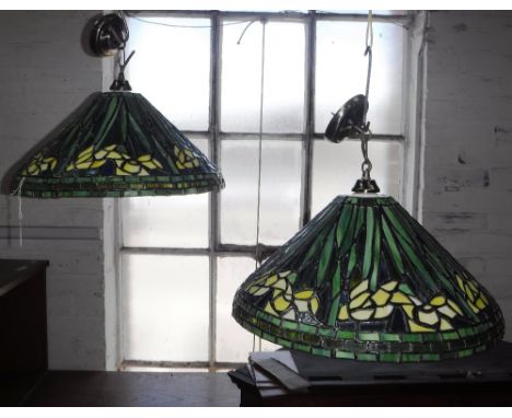 A PAIR OF TIFFANY STYLE HANGING LIGHT SHADES