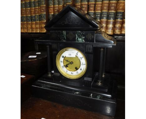 A VICTORIAN BLACK SLATE MANTEL CLOCK of architectural form (key and pendulum in office)
