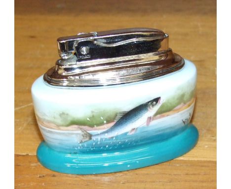 A Ronson table lighter with Minton bone china base decorated with a leaping salmon, and signed P Scott, 6.5cm high, 8.3cm lon