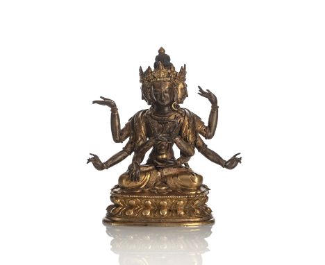 Partiell feuervergoldete Bronze der UsnishavijayaTibeto-Chinesisch, 18. Jh.H. 17 cmIn Vajrasana auf einem Lotussockel sitzend