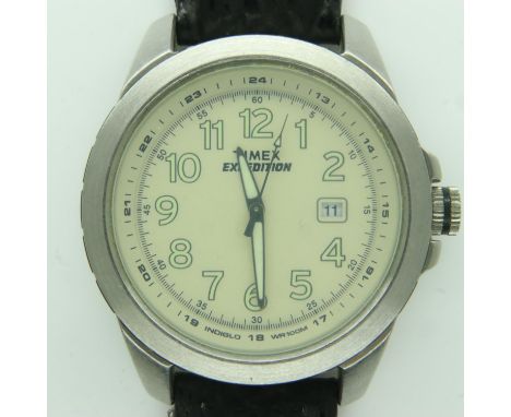 TIMEX EXPEDITION: gents quartz wristwatch with date aperture, on a black leather strap, working at lotting up. UK P&amp;P Gro