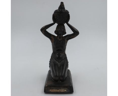 Spelter kneeling deity with plaque for the 1931 Paris Exposition Colonials, H: 29 cm. UK P&amp;P Group 2 (£20+VAT for the fir