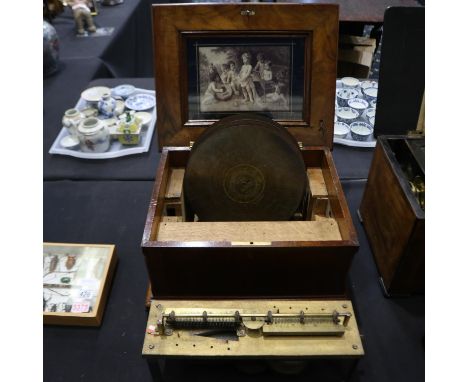 Walnut cased polyphon for restoration with eleven discs, L: 44 cm. Not available for in-house P&amp;P 