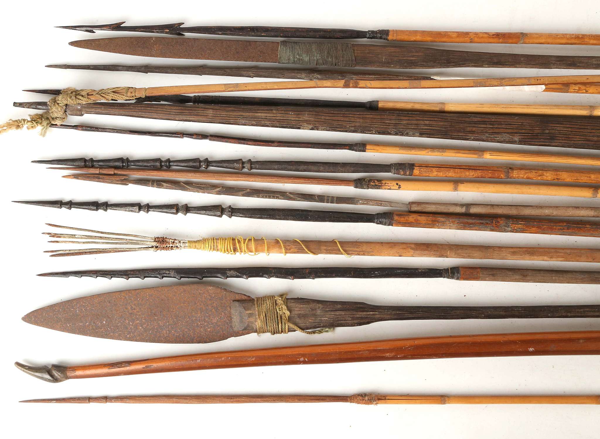 FOURTEEN BAMBOO SPEARS, PAPUA NEW GUINEA Including barbed spears and ...