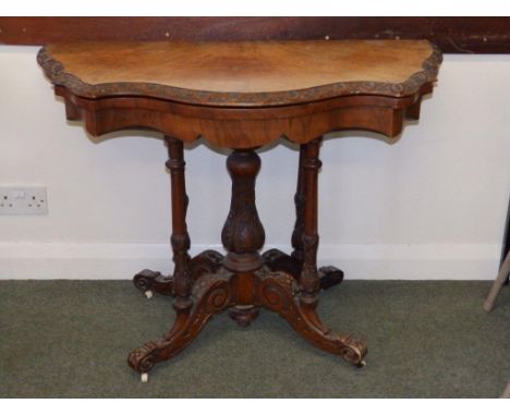 A Victorian shaped folding walnut card table – a/f 