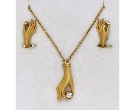 3-tlg. Schmuck-Garnitur "Las Manos", Juw.Carrera y Carrera, Madrid 2. Hälfte 20. Jh. 18 kt GG. Bestehend aus Anhänger m. Kett