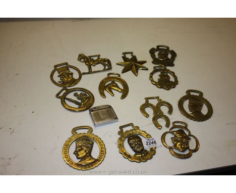 A quantity of Royal Commemorative Horse brasses, 1907, 1935, 1936, etc and a QEII souvenir Lighter.