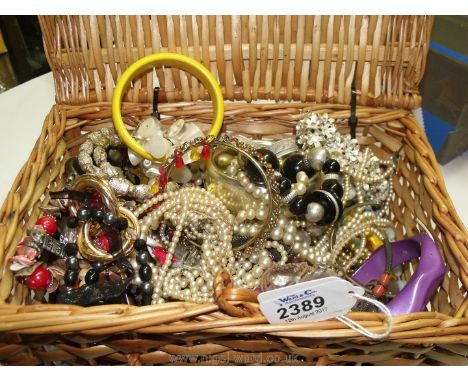 A small Fortnum and Mason hamper with a mixture of costume jewellery