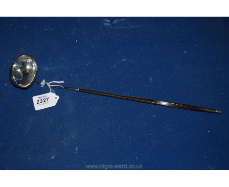 A Silver Toddy Ladle, dated 1745, with whale bone handle