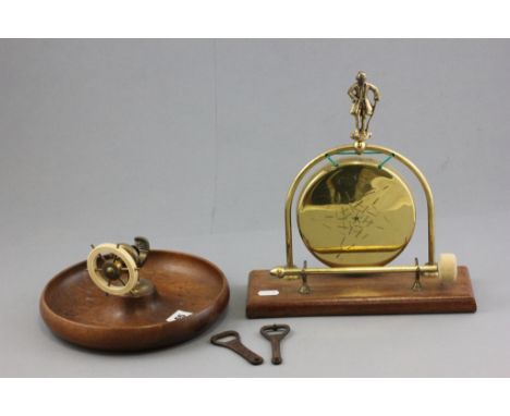 Brass Gong and Striker plus a Ships Wheel Nutcracker in Wooden Bowl and a Vintage Guinness Bottle Opener plus a Vintage Coron