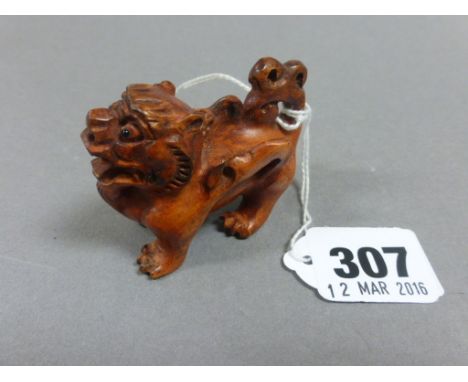 Signed wood netsuke of a Dragon