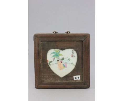 Ceramic erotic plaque in wooden frame  