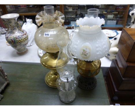 Victorian Oil Lamp with Milk Glass Shade, Amber Glass Well and Cast Iron Stand together with a Brass Oil Lamp and another Oil
