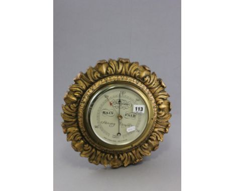 Atsonea Circular Barometer in Gilt Plaster Scroll Frame marked Short & Mason London